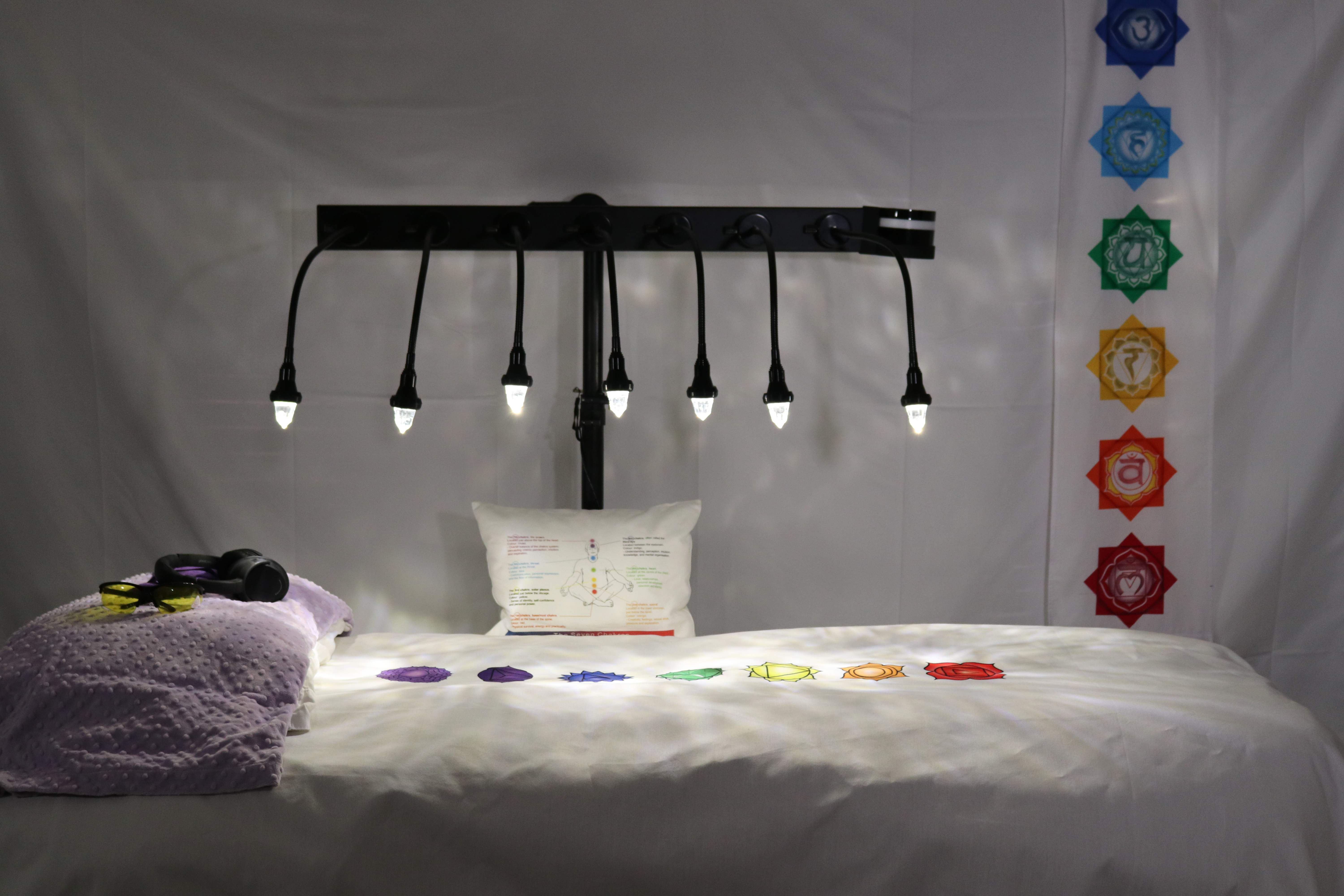 White LED lights above white StellarWaves crystal bed